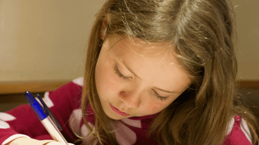 young girl being screened for reading risk