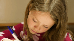young girl being screened for reading risk